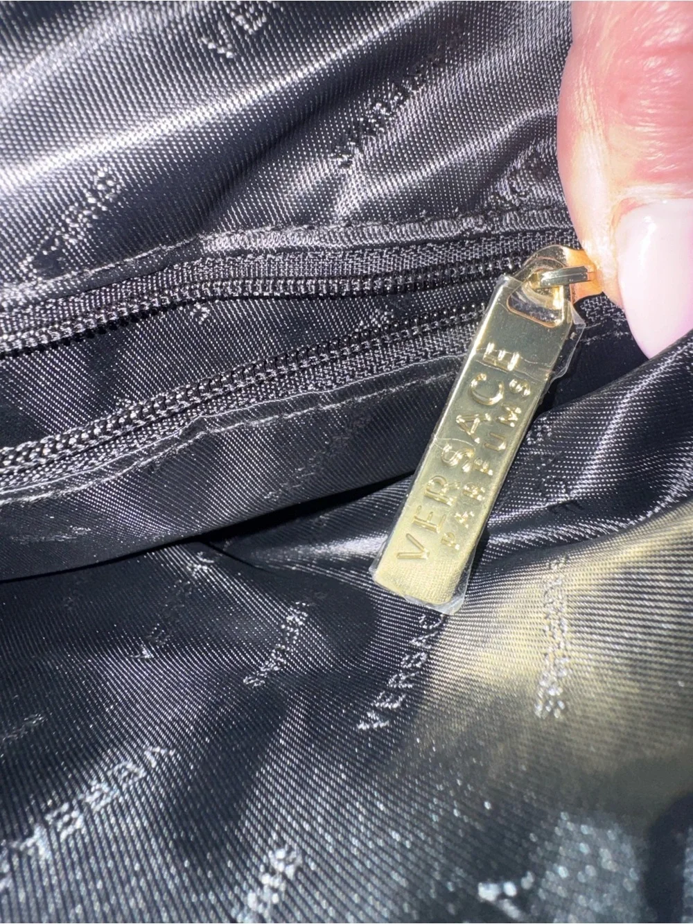 Versace Black Quilted Wave Wristlet with Gold Plaque